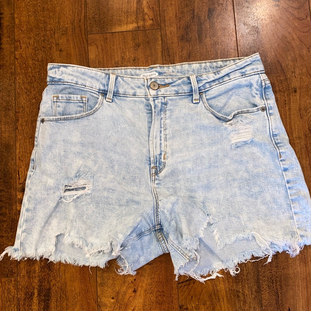 light wash distressed denim shorts.